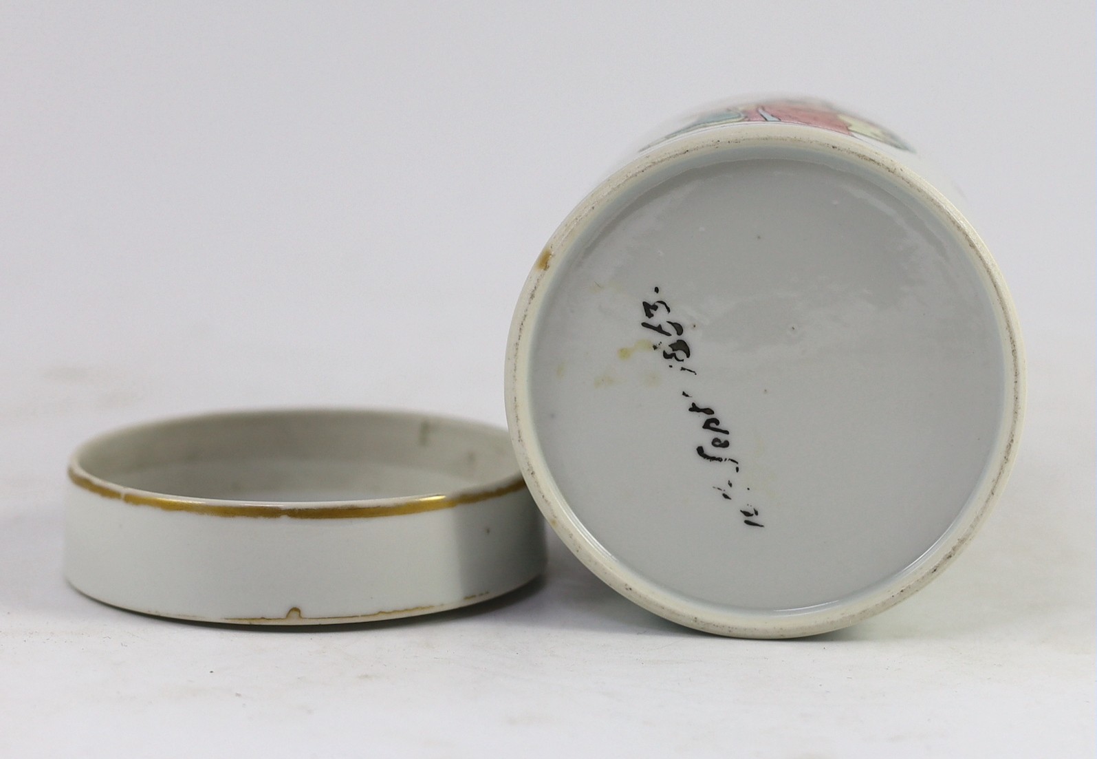 A Chinese famille rose fencai inscribed cylindrical jar and cover, mid 19th century, 11.2cm high